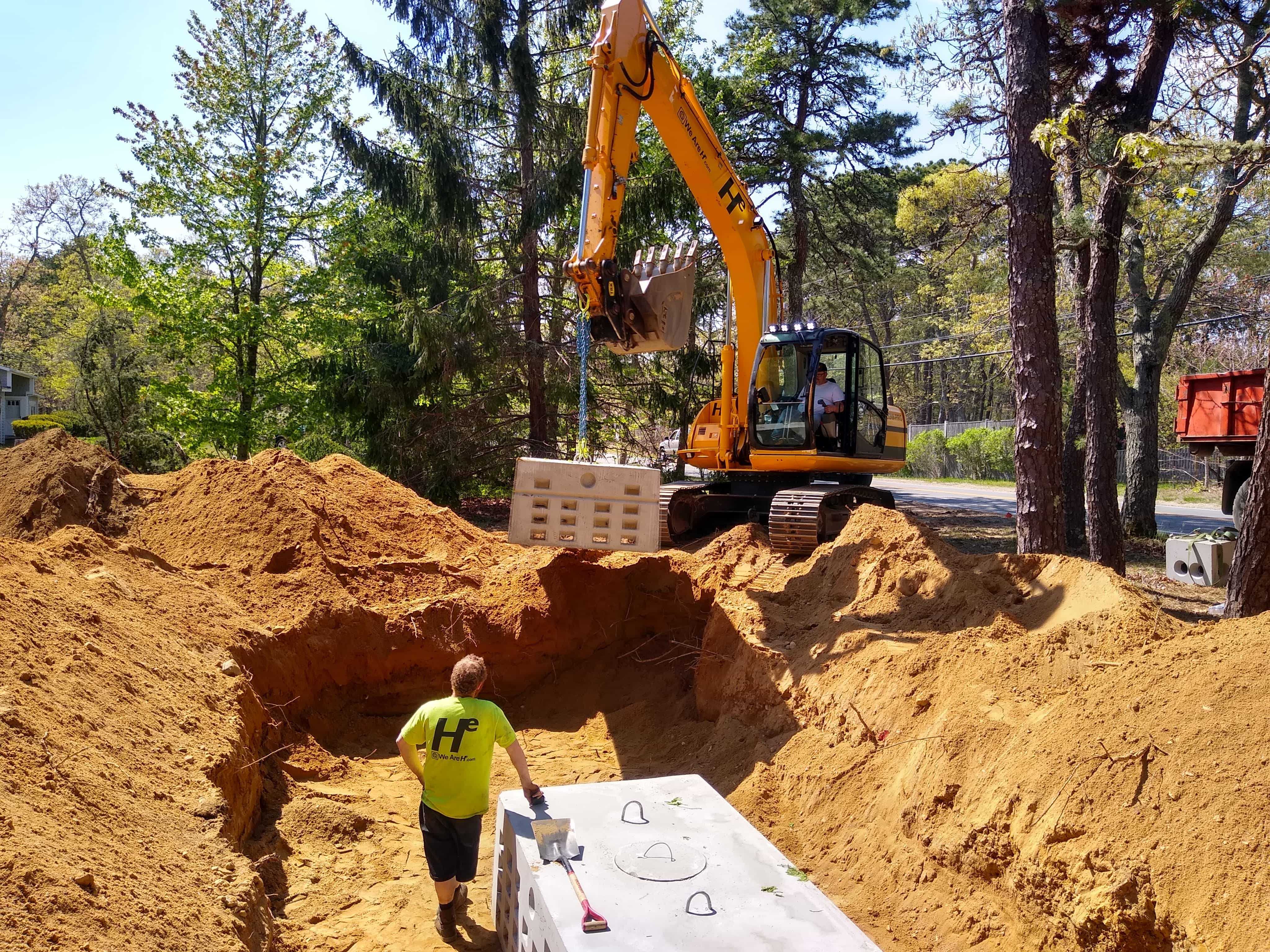 Hunter Environmental Excavator installing a septic